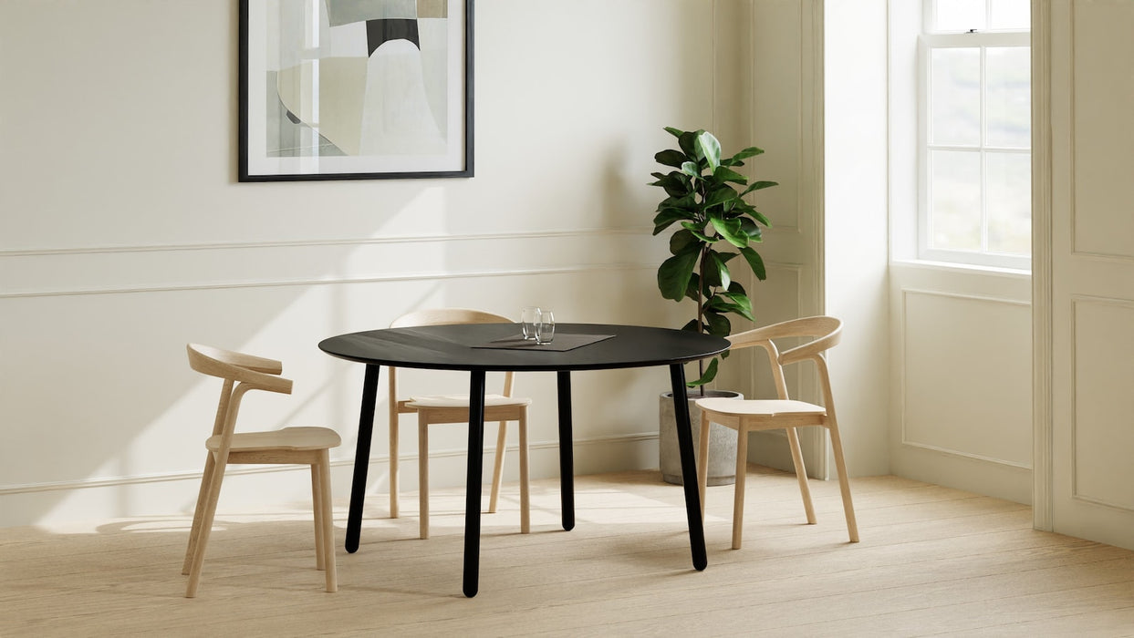 Round Dining Table in Black Oak on Black Steel Danish Legs, 4-6 seater / Earth Collection