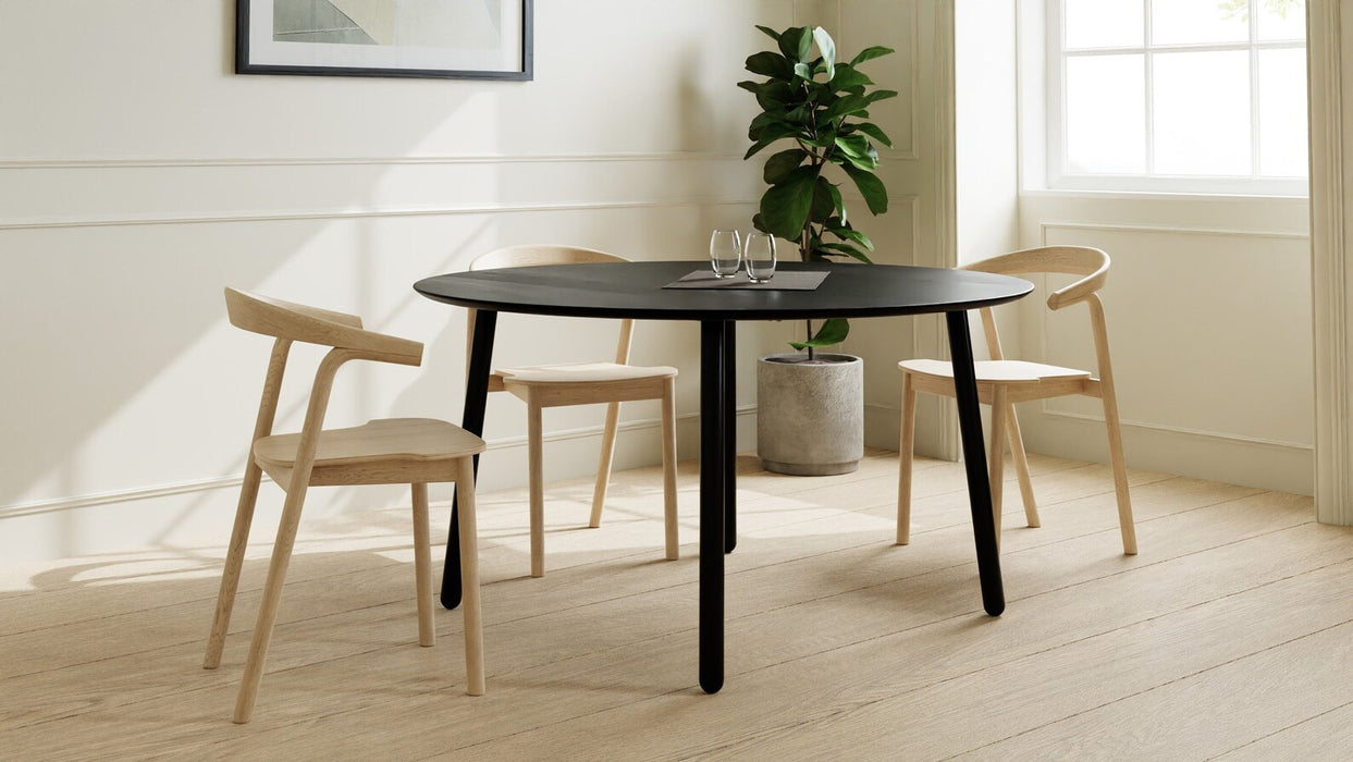 Round Dining Table in Black Oak on Black Steel Danish Legs, 4-6 seater / Earth Collection