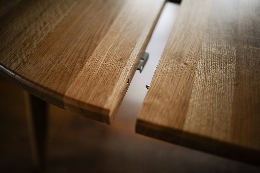 Extendable Round Oak Dining Table on BLACK Danish Steel Legs