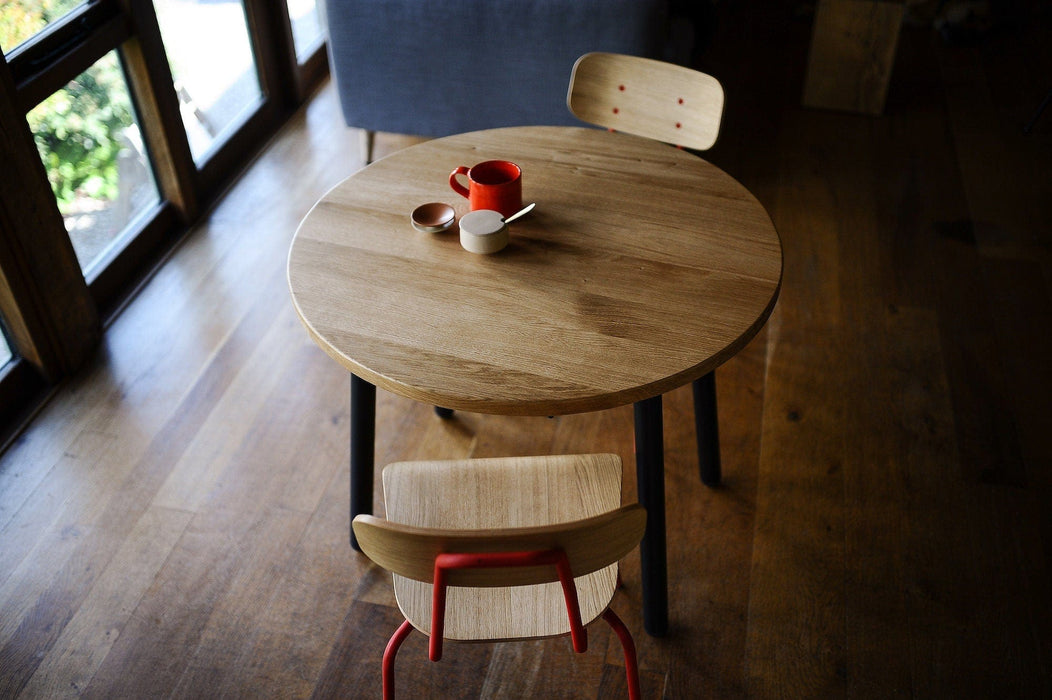 Extendable Round Oak Dining Table on BLACK Danish Steel Legs